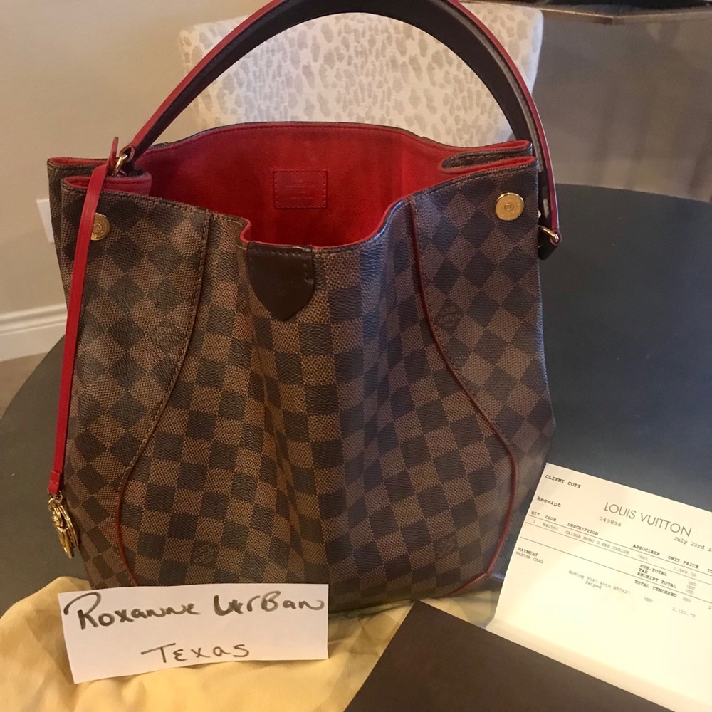 Authentic Louis Vuitton Caissa Hobo.